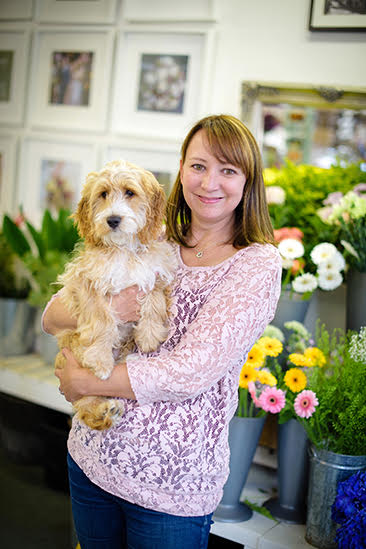 Tracy, the florist behind Peony & George, in her Stamford flower shop
