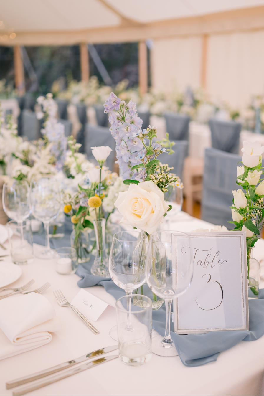 Bud vase table number styling, Lucia and Alex's marquee wedding in Rutland